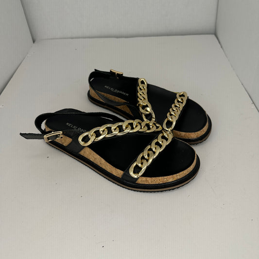 Kelsi Dagger Brooklyn Script Sandals Black and Gold Adjustable Ankle Strap Lightweight Gold Chain Accents Limited Edition Lightweight